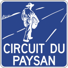 Panneau d'acheminement vers la route ou le circuit touristique