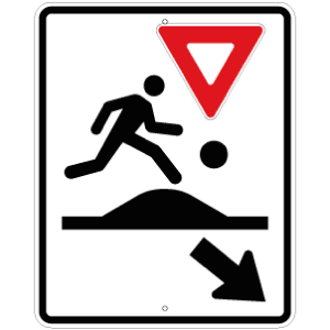 Passage pour enfants près d'un terrain de jeux sur dos d'âne allongé