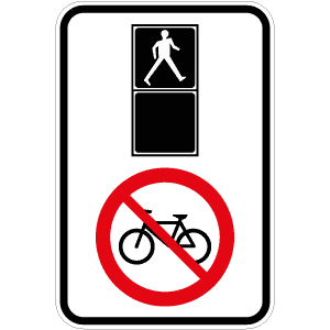 Interdiction pour les cyclistes de traverser à un feu pour piétons